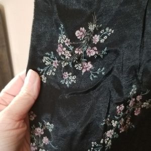 Full length 90s style skirt with flower pattern.